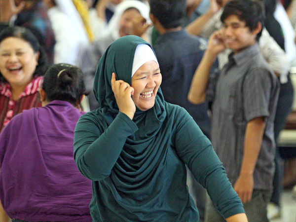 Laughter Yoga Session with Delayed Passengers at JFK Airport-img